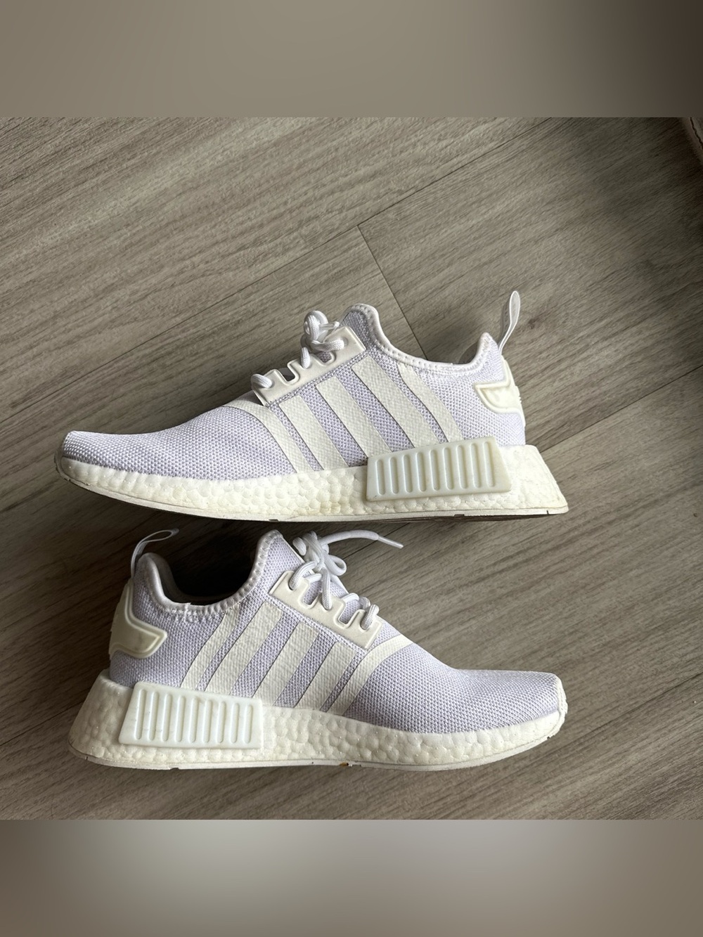 Adidas white NMD R1 sneaker.